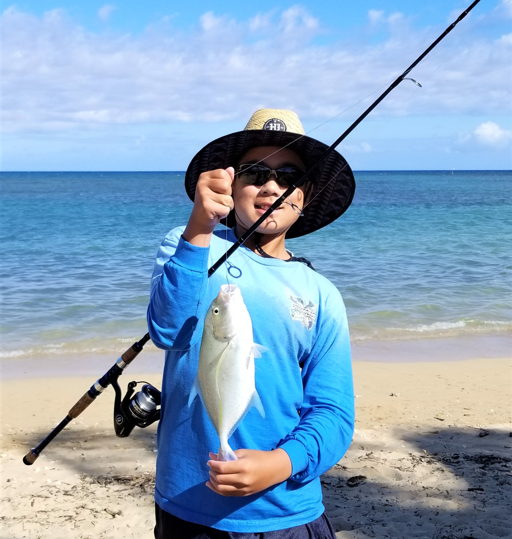 Guest Post Young angler hooks omilu off the sardine pile! Hawaii
